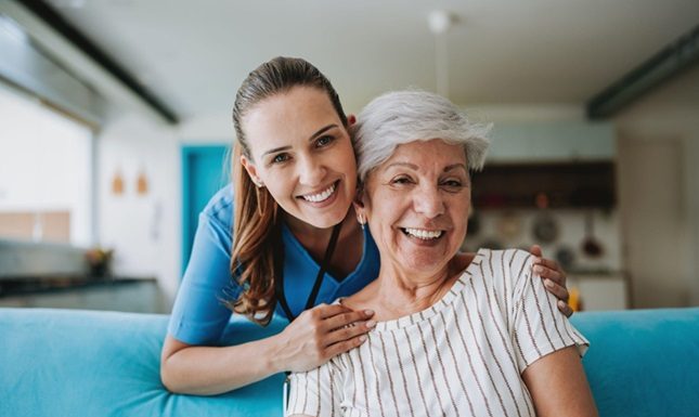 The Essential Guide to Home Care Services: Supporting Independence at Any Age A Nurse and Her Client Smiling