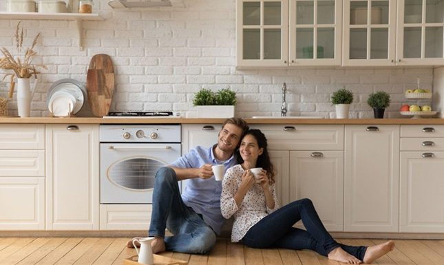 Creating Your Dream Kitchen: Expert Tips for Stunning Renovations in Calgary A couple enjoying their newly renovated kitchen, showcasing expert tips for stunning kitchen renovations in Calgary