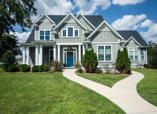 Boosting Curb Appeal and Efficiency with Expert Exterior Renovations in Calgary Charming house with recent exterior renovations, showcasing durable materials and enhanced exterior design